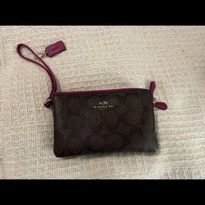 Coach. Wristlet.  Brown/berry.